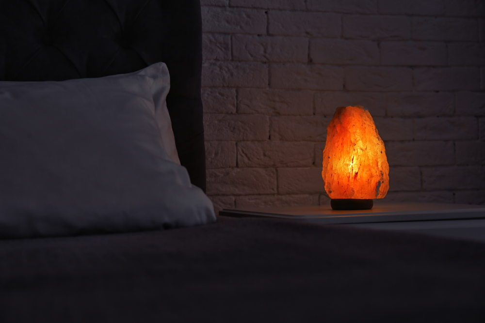 Salt lamp on nightstand